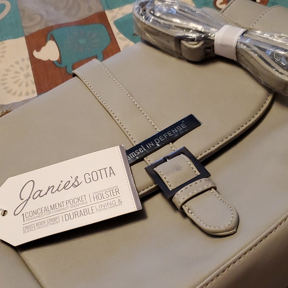Damsel In Defense purse